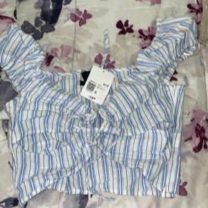 Cute lightblue/white top for a variety of occasion💙